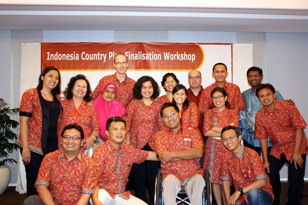Matthew Hanning stood in a line with his colleagues from CBM in Indonesia. 