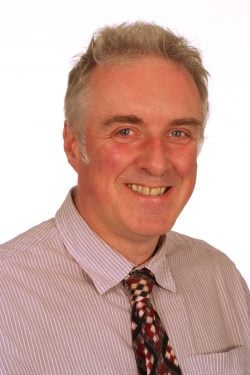 A man, Dr Andy Pyott, smiling at the camera