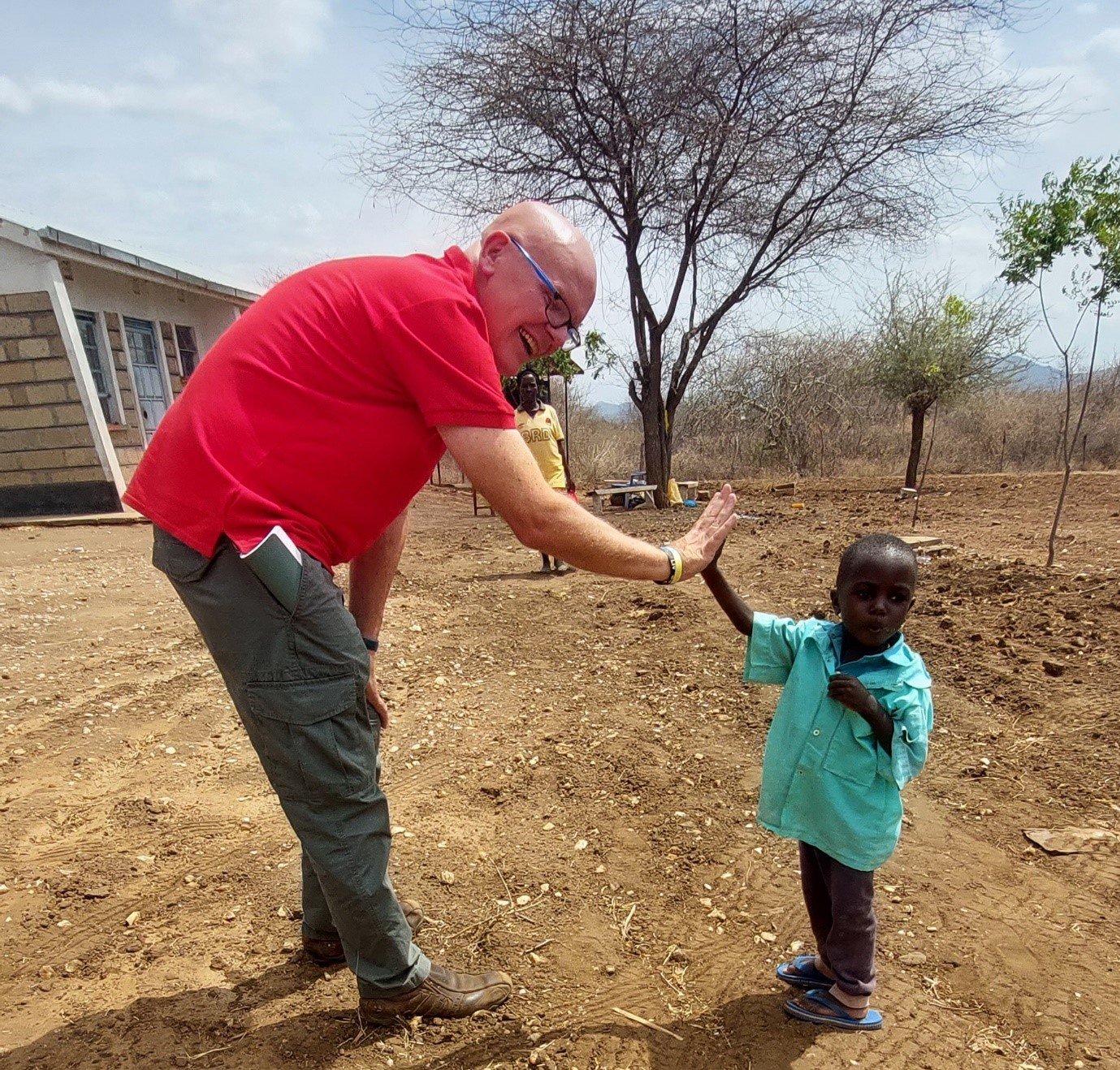  <p>Elion, a 3 year old boy with severe malnutrition standing with David Taylor from CBM UK.</p>
 
<p class=