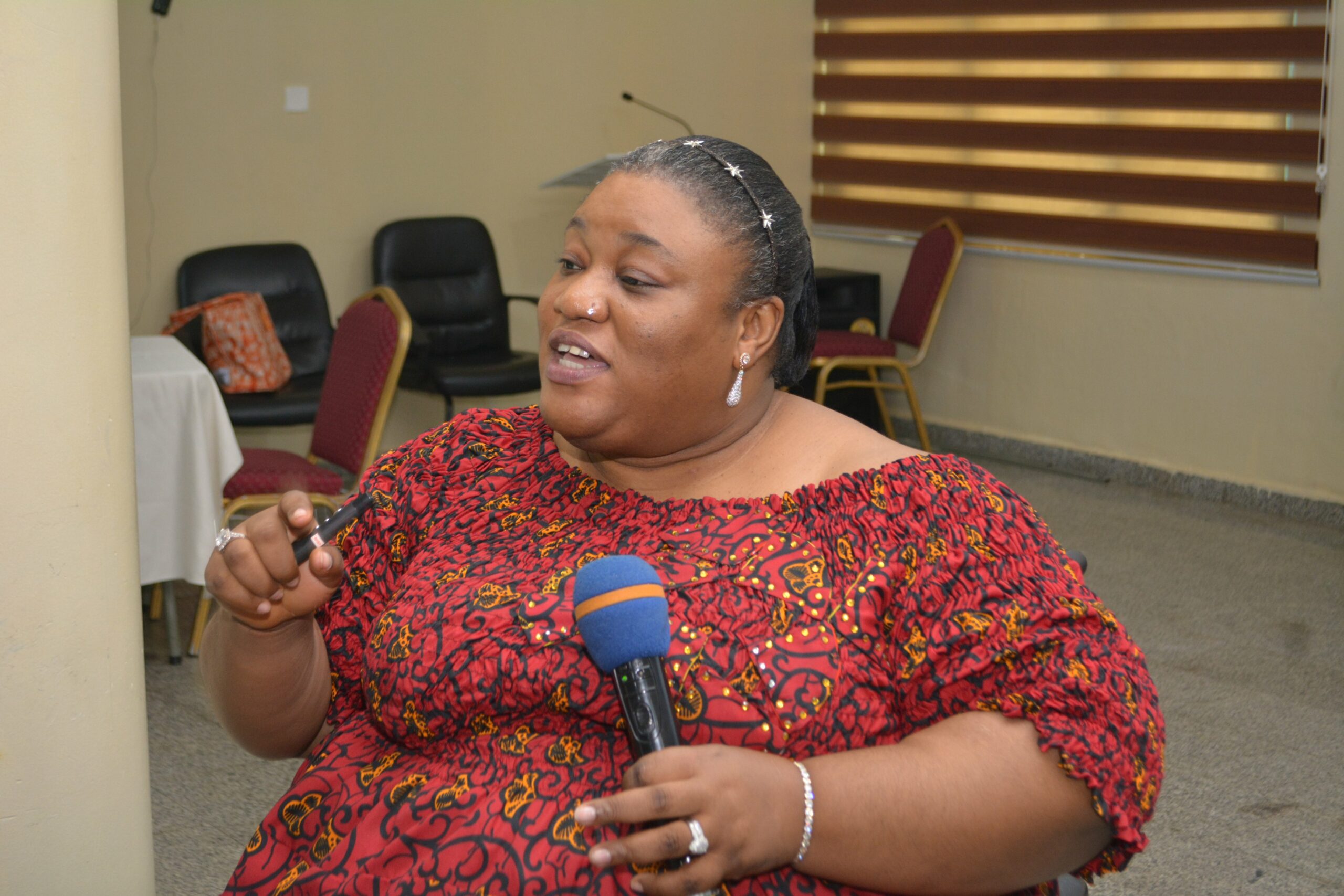 Irene Ojiugo, Executive Director DRAC, speaking at a training session.