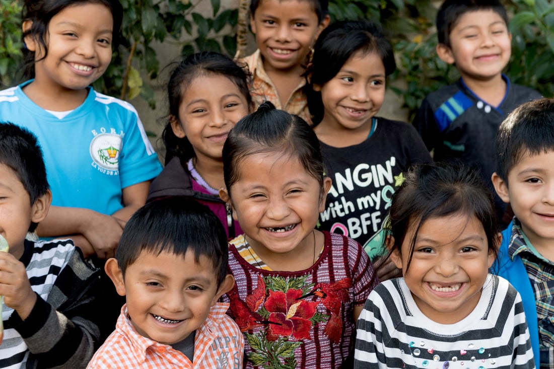 Group of children smiling in Guatemala