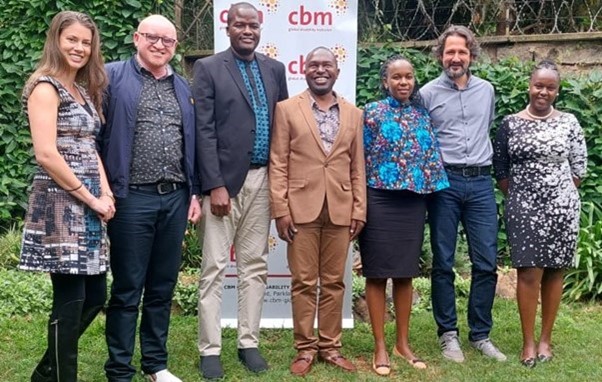 Edwin Osundwa, CBM Global Kenya Country Director and Barlet Jaji, HelpAge Kenya Country Director (centre) with other members of both organisations meet together in Nairobi to discuss Kenya-specific collaboration