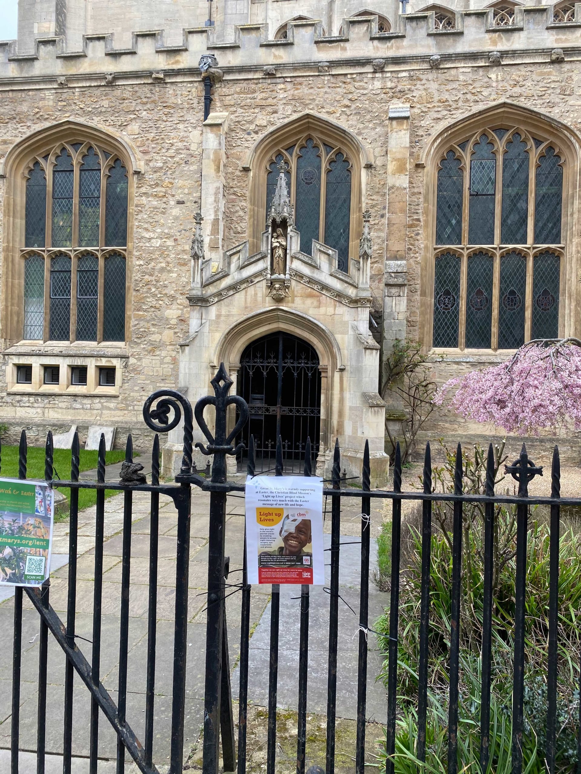 Light up Lives poster displayed on the gate outside a church