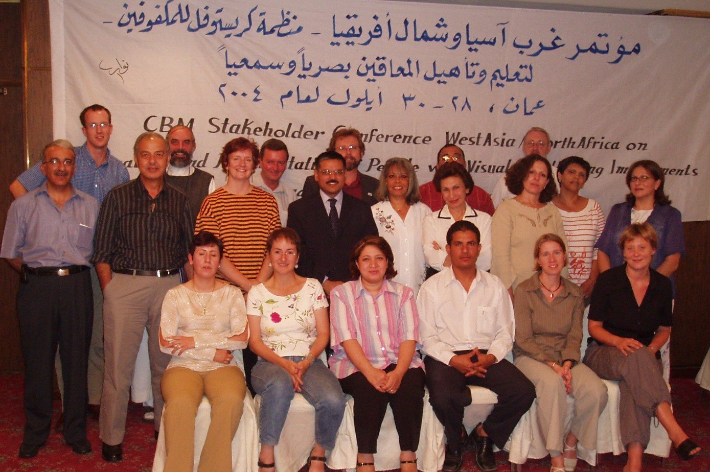 Matthew Hanning, CBM UK's Director of Programme Development standing with CBM colleagues at a conference.