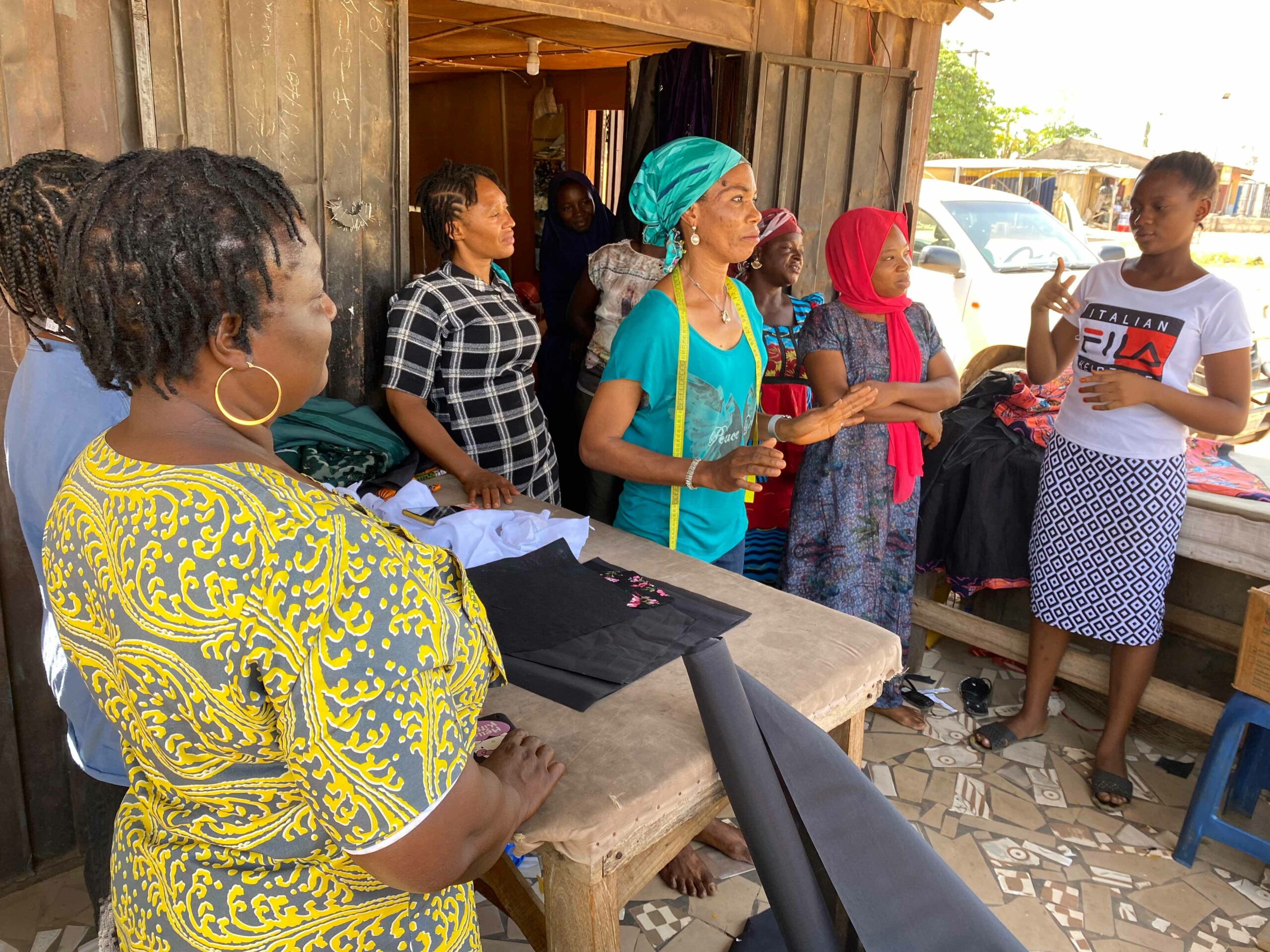 Women taking part in a tailoring class.