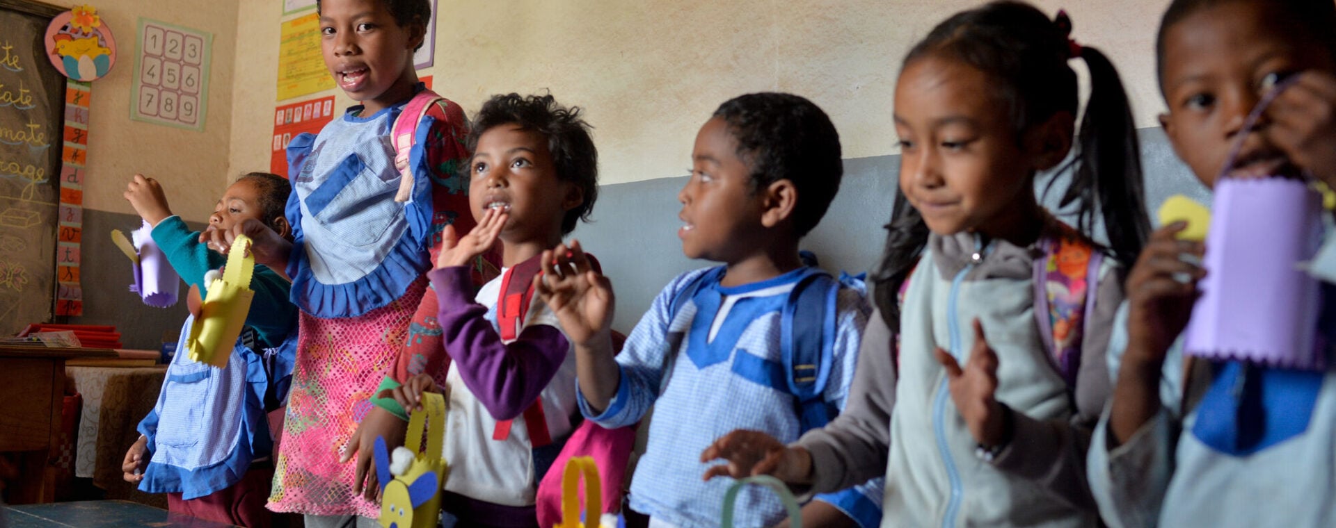 Lucas at school with other children in Madagascar.