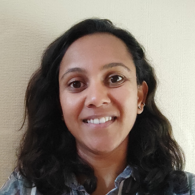 Headshot of Poonam