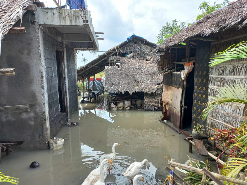 Flooded houses after typhoon Trami.