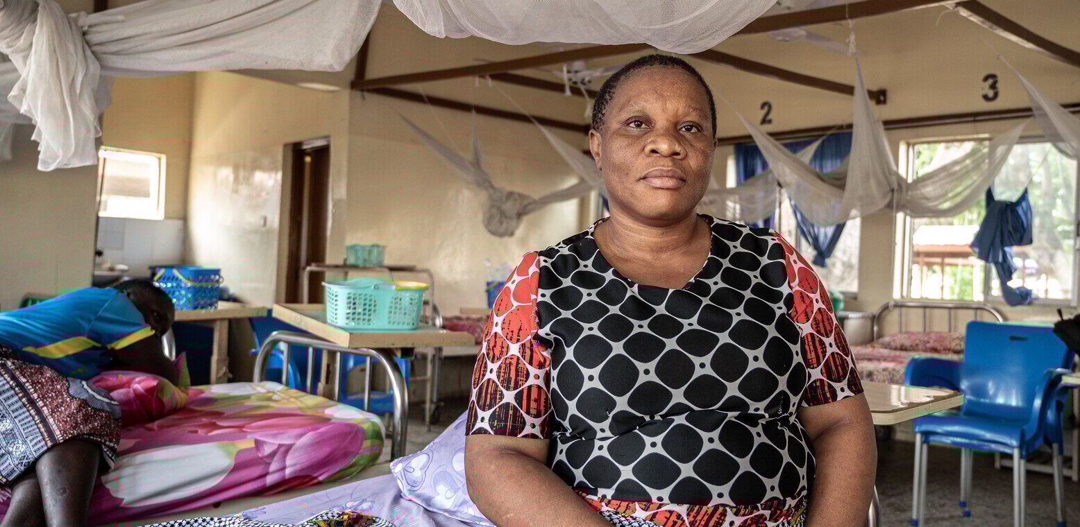 A woman sat in a health clinic.