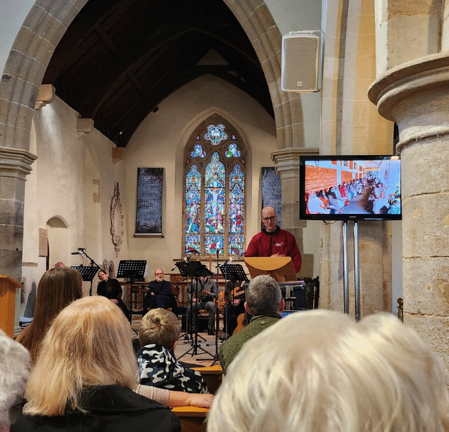 Matthew Hanning doing a church presentation for CBM Sunday