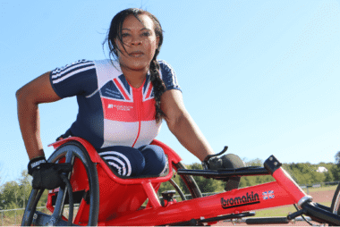 Anne Wafula Strike wearing a team GB uniform in a racing chair.