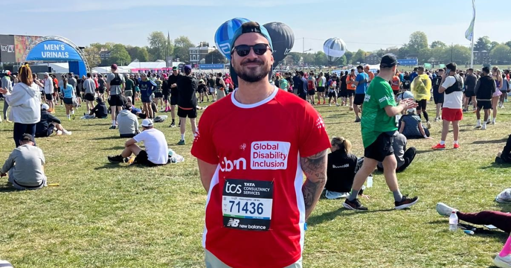 Alex, marathon runner, wearing CBM UK running t-shirt