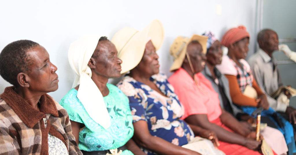 A group of ladies from Zimbabwe having their eyes examined.