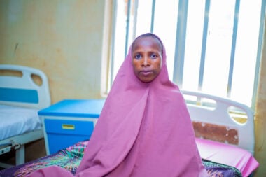 A lady facing the camera in hospital in Nigeria.