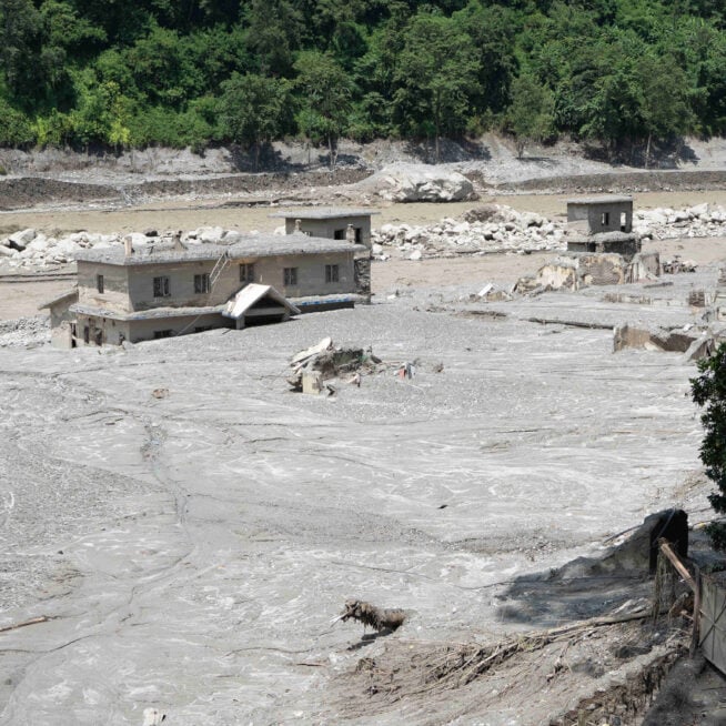 A house surrounded by mud after the flooding in Nepal.